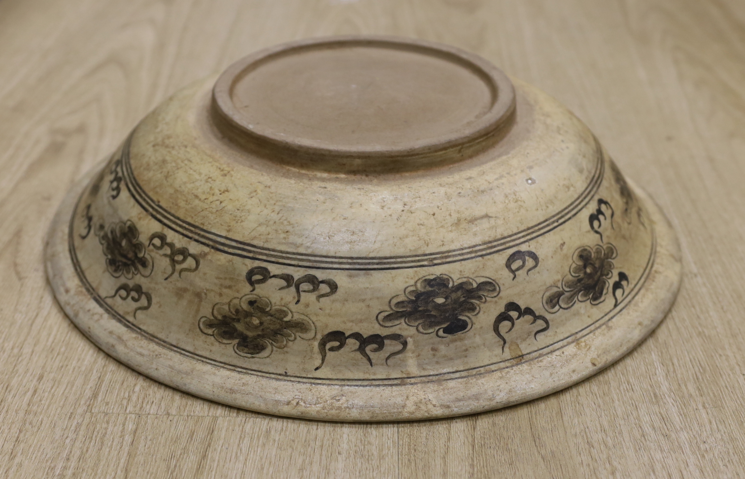 A Sukhothai style underglaze black 'dragon' dish, 47cm